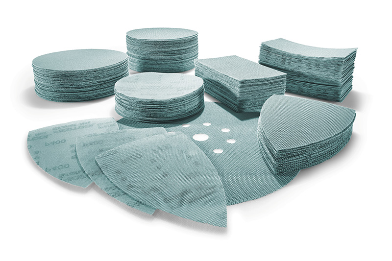 Een verzameling verschillende netschuurmateriaalopzetstukken