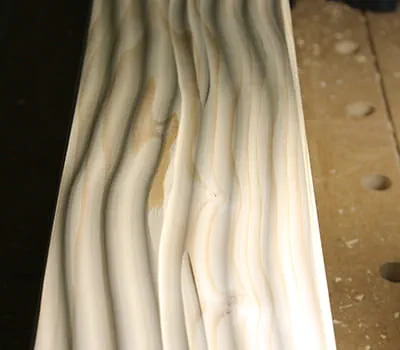 Schaafbeeld zoals het bij het werken met een ruweblokschaaf ontstaat