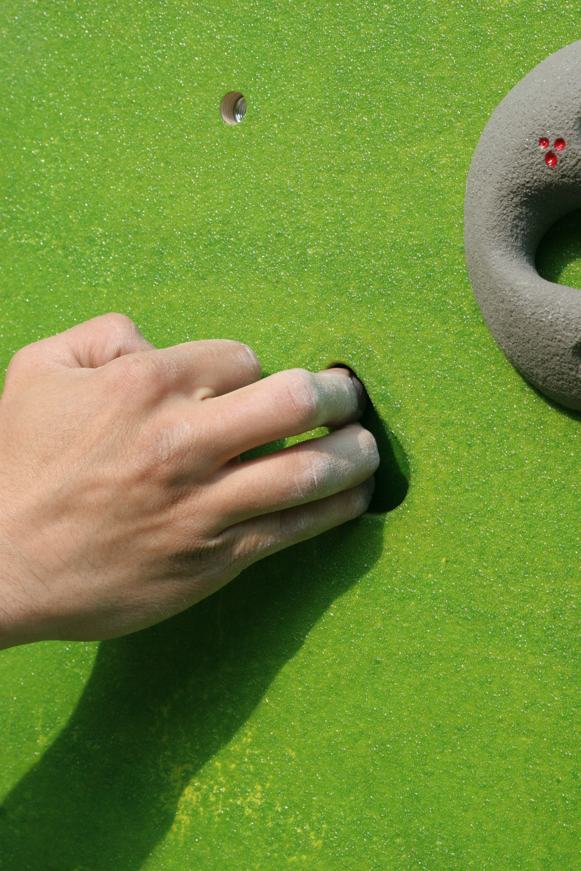 Ouverture permettant de s'accrocher sur un mur d'escalade