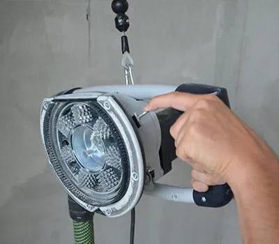 schuurapparaat aan ophanging