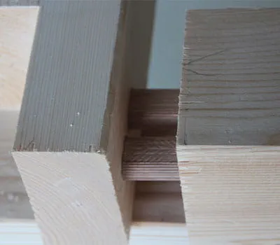 Liaison entre poteaux et traverses