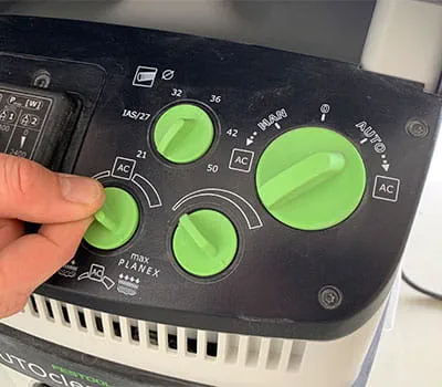 Instellingen op de stofzuiger uitvoeren