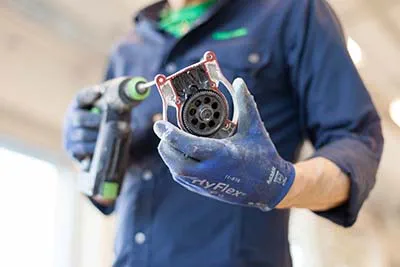 De Planex easy in de servicewerkplaats van Festool